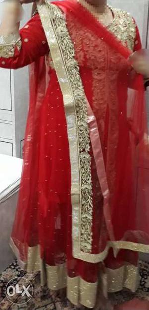 Heavy embroidered bright red designer dress with