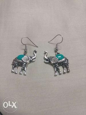 Turquoise lucky elephant earrings. Brand new.