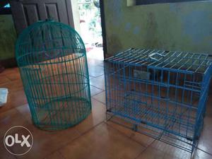 Two Blue And Green Bird and pet Cage