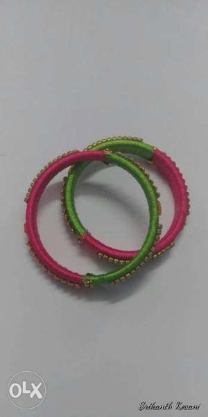 Two Green-and-pink Jhumka Bangles
