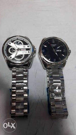 Two Round Silver-colored Watches With Link Straps