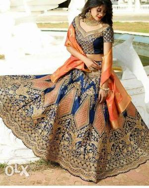 Women's pink n blue lehnga...