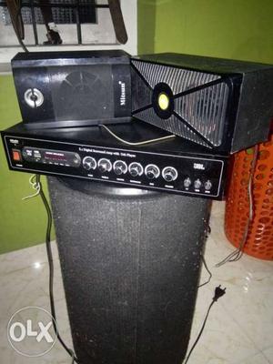 Black 5.1 amblifair with suboofur and 4 speakers