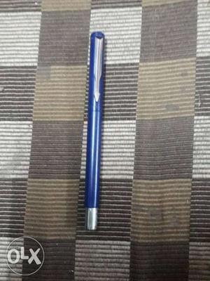 Blue And Gray Ballpoint Pen
