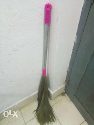 Gray Broom With Pink Handle