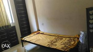 Iron bed available for sale immediately with 2