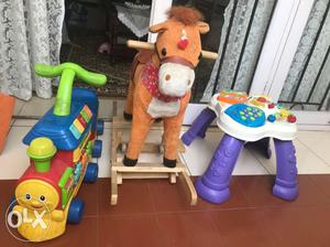 Kids activity table, rocking horse and ride on