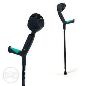 Pair Of Black-and-blue Arm Crutches