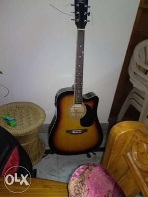 Pluto acoustic guitar.jumbo.with new strings