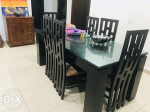 Rectangular Black Wooden Dining Table And Six Black Wooden
