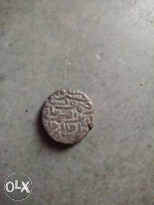 Round Gray Ancient Coin