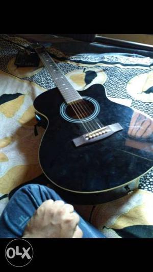 Semi accostic guitar with auto tuner and audio output mic