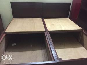 Two single box beds one new another old size each