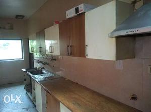 White And Brown Wooden Kitchen Cabinet