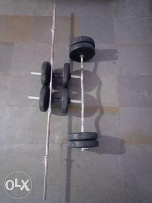 Black And Gray Steel Barbell With Dumbbells