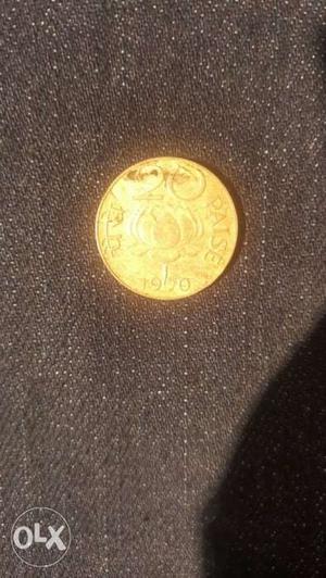 Gold color 20 paise since  Indian coin