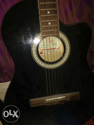 Pluto acoustic guitar black colour good condition
