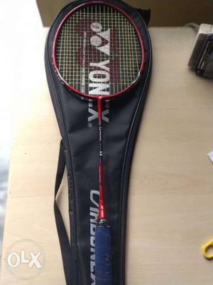 Red And Black Yonex Badminton Racket