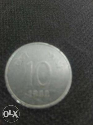 Round  Silver-colored 10 Paise Coin