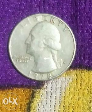  Silver-colored U.S. Liberty Coin