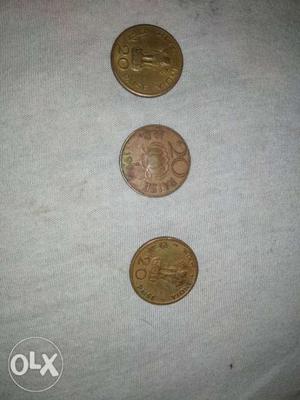 3 golden colour 20 paisa old antique coin