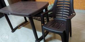 A Set of one dining table and 2 chairs.