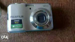 Black Fujifilm Point-and-shoot Camera