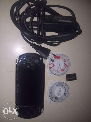 Black Sony PSP With UMD Cases