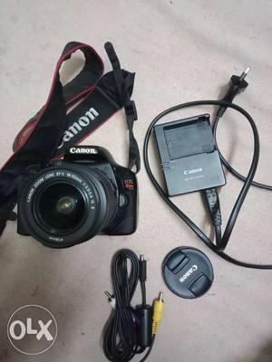 Black canon DSLR Camera With Battery Charger and only one