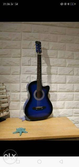 Blue Venetian Cutaway Acoustic Guitar Screenshot