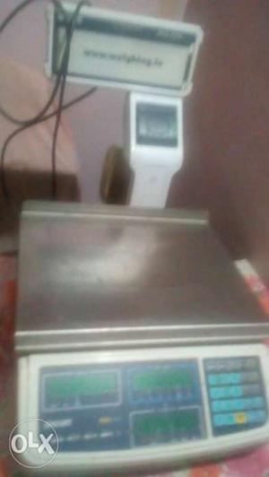 Electronic weighing machine with printing