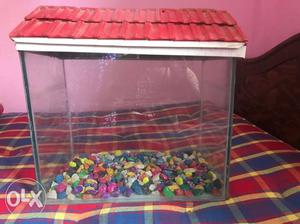 Fish Tank with decorative shed...Colourful stones