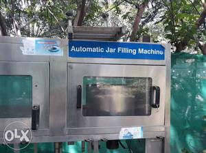Gray Stainless Steel Automatic Jar Filling Machine