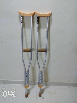 Gray-and-brown Underarm Crutches