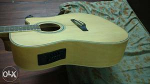 Guitar- Acoustic with in buit tuner, battery,
