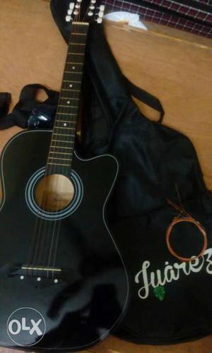 Guitar with all accesories in new condition