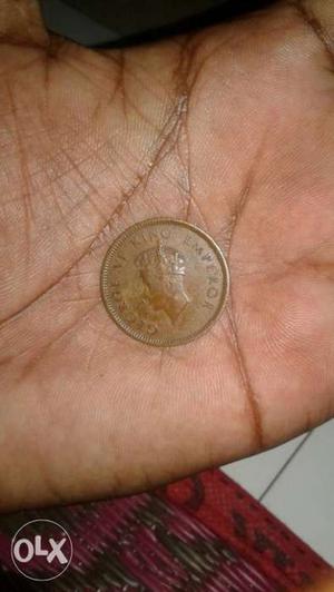 Ound  sliver- colored 1 quarter indian anna