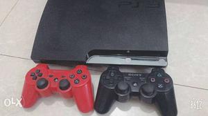 Ps3 console with two controllers and 22 games
