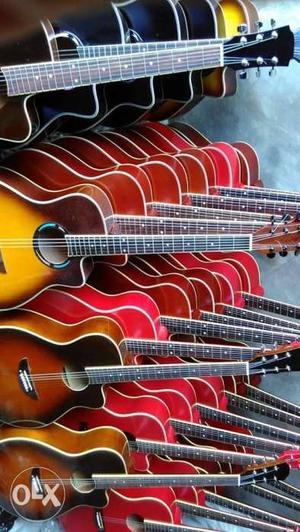 Red-and-brown Acoustic Guitars