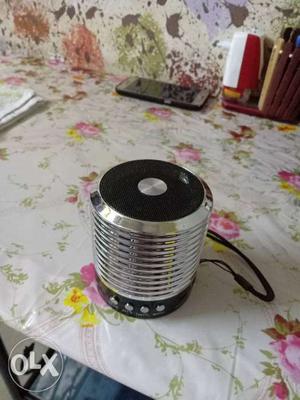 Round Gray And Black Portable Speaker