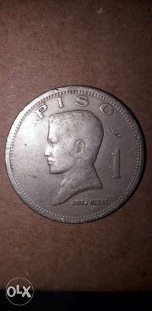 Round Silver-colored 1 Philippine Peso Coin