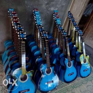 Teal-and-black Single-cutaway Acoustic Guitar Lot