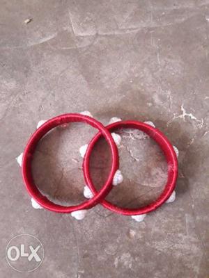 Two Red Braceletrs