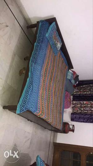 Brown And Blue Bedspread