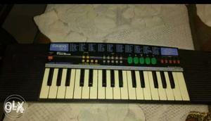 Casio piano in working condition with cover and