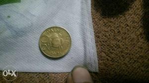 Gold colore 20 paisa india coin call me