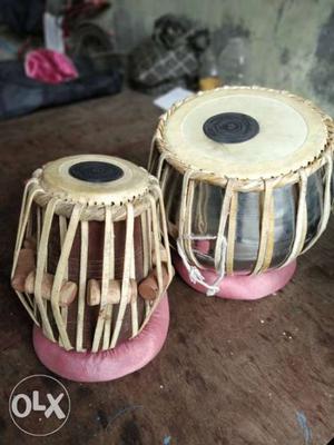 Gray And Brown Tabla Drum with black cover to keep it