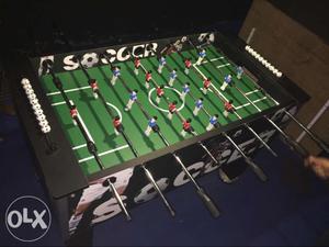 Green And Black Foosball Table