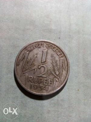 Hiii Very antique 1/2 rupee If want to reduce