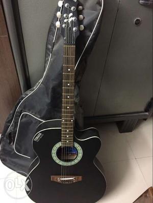 In very good condition black guitar only 6months